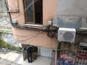 Electricity wiring in an apartment block in central Tirana 